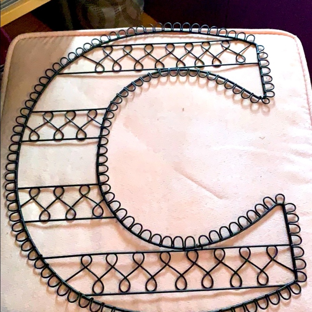 Wire letter C wall art